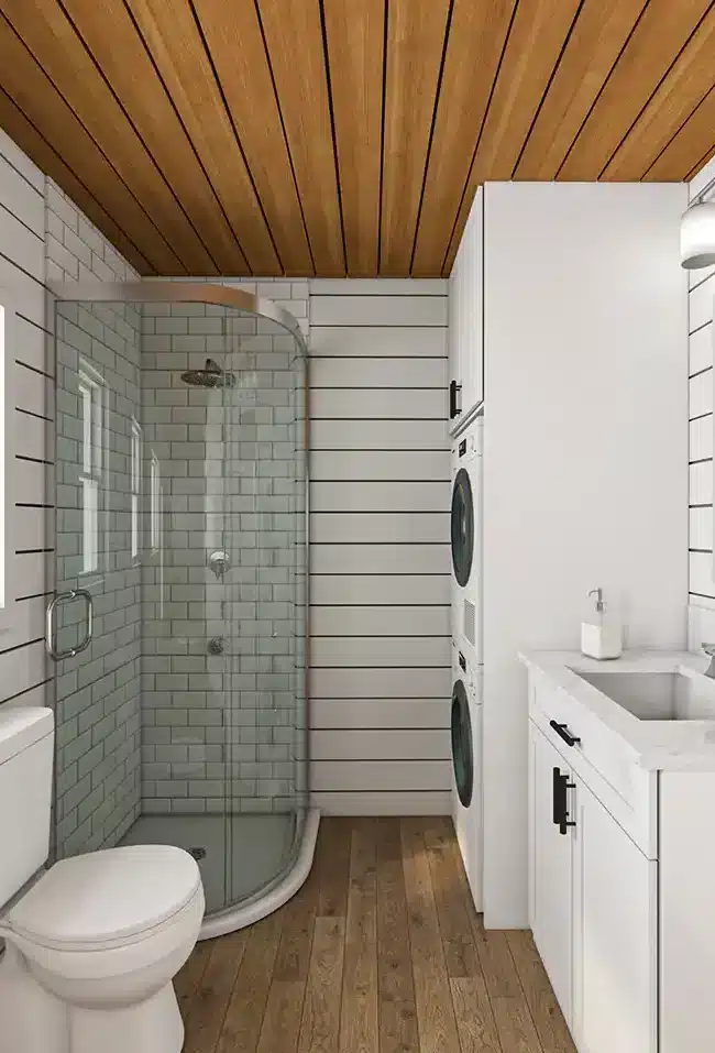 Modern barndominium bathroom with shiplap walls subway tile shower and wood ceiling