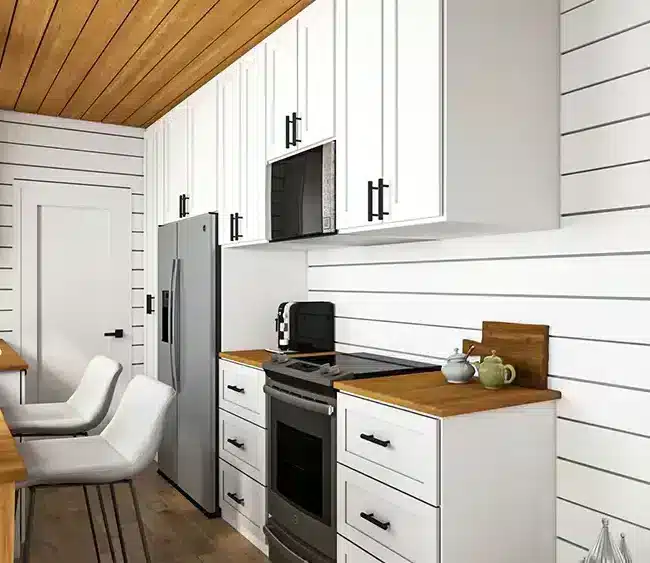 Modern barndominium kitchen with shiplap walls wood ceiling and breakfast bar