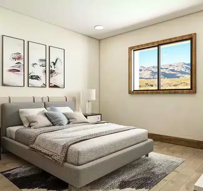 Modern barndominium bedroom with neutral tones and Arizona desert views