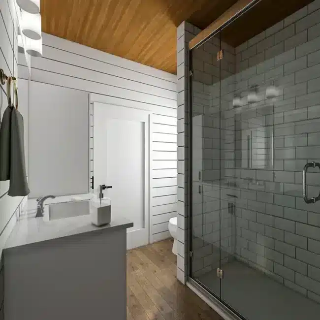 Modern barndominium bathroom with shiplap walls and subway tile shower